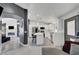 Modern kitchen features stainless steel appliances, a breakfast bar, and stylish pendant lighting at 715 Heritage Point Dr, Henderson, NV 89002