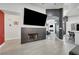 Spacious living room showing a fireplace and open access to the kitchen and other living area at 715 Heritage Point Dr, Henderson, NV 89002