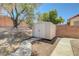 Storage shed in backyard with pathway at 715 Heritage Point Dr, Henderson, NV 89002