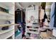 Spacious walk-in closet featuring ample shelving and hanging space at 715 Heritage Point Dr, Henderson, NV 89002