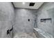 Updated walk-in shower showcasing elegant tile work and convenient bench seating at 715 Heritage Point Dr, Henderson, NV 89002