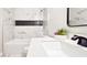 Modern bathroom featuring a tub-shower combo, sleek vanity, and contemporary finishes at 744 Hubbard St, Las Vegas, NV 89110
