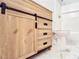Stylish bathroom vanity with a sliding door and marble floors at 744 Hubbard St, Las Vegas, NV 89110