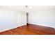 Bright bedroom featuring hardwood floors, closet, and neutral paint at 744 Hubbard St, Las Vegas, NV 89110