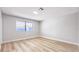 Bright bedroom with hardwood floors and view at 744 Hubbard St, Las Vegas, NV 89110