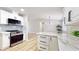 Gorgeous kitchen with stainless steel oven, sleek microwave, and spacious marble countertops at 744 Hubbard St, Las Vegas, NV 89110
