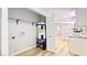 Bright laundry area features a water heater and storage space, adding convenience to the home at 744 Hubbard St, Las Vegas, NV 89110