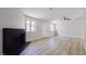 Spacious living room with fireplace and wood-look floors, bright and airy at 744 Hubbard St, Las Vegas, NV 89110