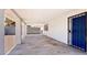 Spacious covered patio area with access to the home's entrance and views of the surrounding property at 744 Hubbard St, Las Vegas, NV 89110