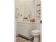 Bright powder room features a white vanity with a vessel sink and decor at 7468 Wellfleet Bay Ave, Las Vegas, NV 89179