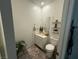Stylish half bath with modern fixtures and decor at 7468 Wellfleet Bay Ave, Las Vegas, NV 89179