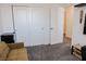 Spacious bedroom with large closet, neutral carpet, and ample natural light at 7468 Wellfleet Bay Ave, Las Vegas, NV 89179