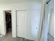 A small closet with white doors at 7468 Wellfleet Bay Ave, Las Vegas, NV 89179