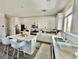 Bright kitchen with a central island, modern appliances, and sleek countertops at 7468 Wellfleet Bay Ave, Las Vegas, NV 89179