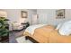 Charming bedroom with floral wall accents, comfortable bed, and art, creating a peaceful and inviting atmosphere at 7533 Garnet Moon St, North Las Vegas, NV 89084