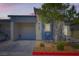 Charming single-story home with a well-manicured front yard and a private two-car garage at 7533 Garnet Moon St, North Las Vegas, NV 89084