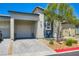 Charming single-story home with a well-manicured front yard and a private two-car garage at 7533 Garnet Moon St, North Las Vegas, NV 89084