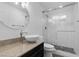 Bright bathroom featuring a stand up shower, modern vanity, and neutral colored walls at 7627 Boca Raton Dr, Las Vegas, NV 89113
