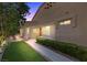 Inviting home entrance with a well-manicured lawn and path leading to the front door at 7627 Boca Raton Dr, Las Vegas, NV 89113