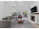 Bright living room with a fireplace, hardwood floors, and comfortable seating area at 7627 Boca Raton Dr, Las Vegas, NV 89113