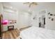 Bright bedroom features wood floors, a desk area, and ample closet space at 764 Ricota Ct, Henderson, NV 89012