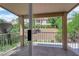 View from balcony featuring covered area, railing, and neighborhood views at 7837 Sea Rock Rd, Las Vegas, NV 89128
