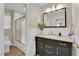 Bathroom showcasing a vanity with marble countertops and sleek fixtures at 7837 Sea Rock Rd, Las Vegas, NV 89128