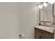 Stylish half bathroom featuring elegant vanity and modern fixtures at 7837 Sea Rock Rd, Las Vegas, NV 89128