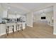 Inviting living space seamlessly integrates the kitchen and living room for modern living at 7837 Sea Rock Rd, Las Vegas, NV 89128