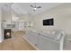 Spacious living room with fireplace, comfortable seating, and an open floor plan at 7837 Sea Rock Rd, Las Vegas, NV 89128