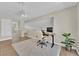 Bright office space with desk, chair, and ample natural light at 7837 Sea Rock Rd, Las Vegas, NV 89128