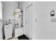 Utility room with a water heater, washing machine, and storage at 7837 Sea Rock Rd, Las Vegas, NV 89128