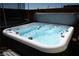 Relaxing hot tub with crystal blue water, perfect for unwinding after a long day at 7990 Formitch Ct, Las Vegas, NV 89166