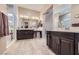 Spacious bathroom featuring double vanities, a walk-in shower, and modern fixtures at 800 Rosewater Dr, Henderson, NV 89011