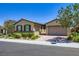 Attractive single-Gathering home featuring a brick driveway and manicured front yard at 800 Rosewater Dr, Henderson, NV 89011