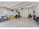 Spacious garage with epoxy flooring, storage cabinets, and ample room for parking and storage at 800 Rosewater Dr, Henderson, NV 89011