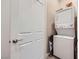 This practical laundry closet features a stacked washer and dryer set at 800 Rosewater Dr, Henderson, NV 89011