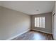 The bedroom features a modern design with sleek flooring and a bright window for ample natural light at 8070 W Russell Rd # 1046, Las Vegas, NV 89113