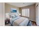 This cozy bedroom boasts natural light, soft blue accents, and a serene atmosphere for relaxation at 8070 W Russell Rd # 1046, Las Vegas, NV 89113