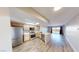 Bright kitchen with stainless steel appliances, light wood cabinets, and marble countertops open to the living space at 8070 W Russell Rd # 1046, Las Vegas, NV 89113