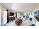 Inviting living room with a large TV, comfortable seating, and access to a private balcony at 8070 W Russell Rd # 1046, Las Vegas, NV 89113