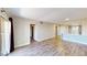 Bright living room with light wood floors and neutral walls, creating a welcoming space at 8070 W Russell Rd # 1046, Las Vegas, NV 89113