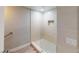 Modern shower stall with glass doors and decorative tile accents in the bathroom at 8070 W Russell Rd # 1046, Las Vegas, NV 89113