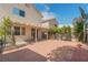 Paver patio with mature landscaping and partial cover offers space for outdoor living at 8509 W Rochelle Ave, Las Vegas, NV 89147
