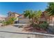 Charming home features a two-car garage, mature tree, and a quaint playhouse at 8509 W Rochelle Ave, Las Vegas, NV 89147
