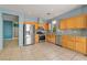 Well-appointed kitchen featuring stainless steel appliances and ample cabinet space at 8509 W Rochelle Ave, Las Vegas, NV 89147