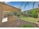 Backyard oasis featuring a built-in BBQ grill and covered patio, perfect for outdoor entertaining at 9044 Blue Raven Ave # R, Las Vegas, NV 89143