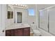 Bathroom featuring a shower-tub combination and a dark wood vanity at 9044 Blue Raven Ave # R, Las Vegas, NV 89143