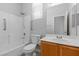 Bright bathroom features accessible tub/shower combination and functional design at 9644 Flying Eagle Ln, Las Vegas, NV 89123