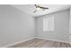 Cozy bedroom with neutral paint and ceiling fan for added comfort at 9644 Flying Eagle Ln, Las Vegas, NV 89123